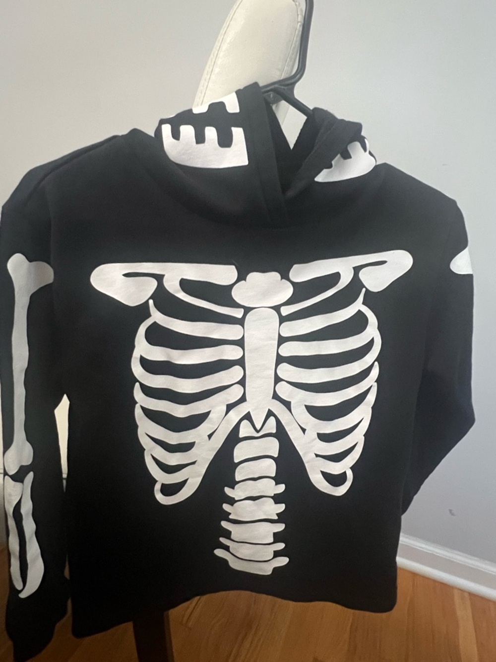 H&M Black Zip-Up Sweater with White Skeleton Graphic